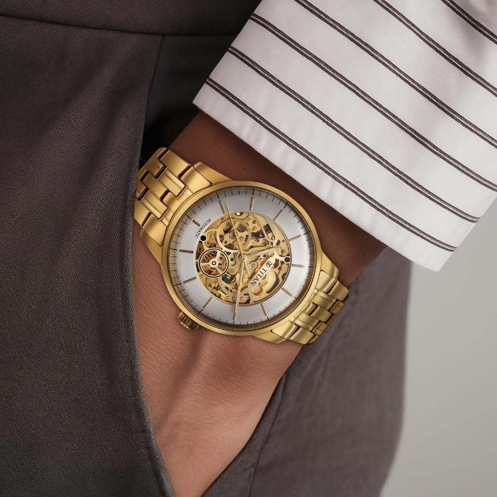 Titan Golden Heart Skeletal Automatic Analog with Silver Dial Yellow Gold Stainless Steel Strap Watch for Men - 90110YM01