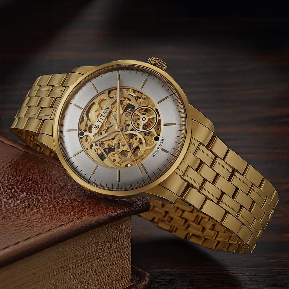 Titan Golden Heart Skeletal Automatic Analog with Silver Dial Yellow Gold Stainless Steel Strap Watch for Men - 90110YM01